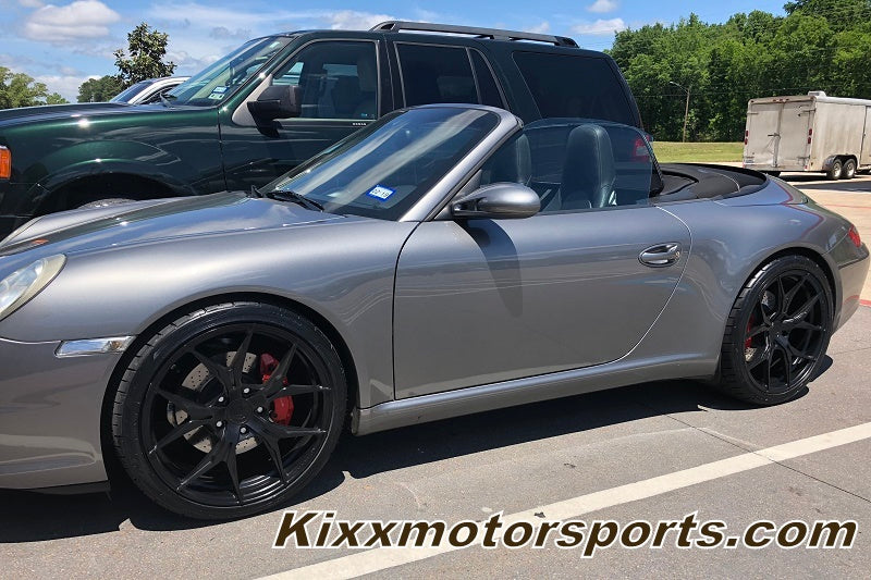 Porsche 911 with 20" Black Concave Wheels  https://www.kixxmotorsports.com/collections/rohana-wheels/products/20-full-staggered-set-rohana-rfx5-20x9-20x12-matte-black-forged-concave-wheels